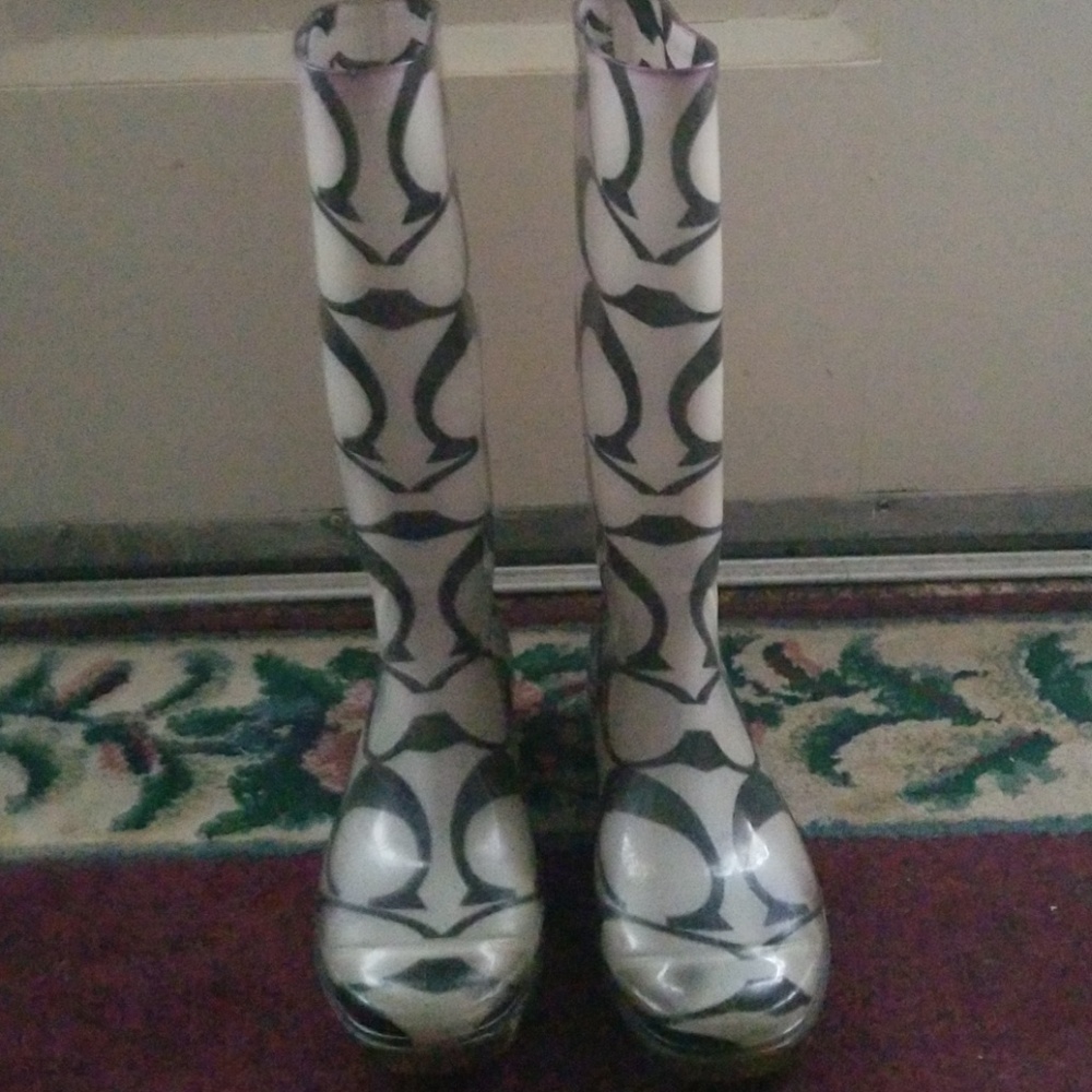 Coach cloudy clear rain boots.